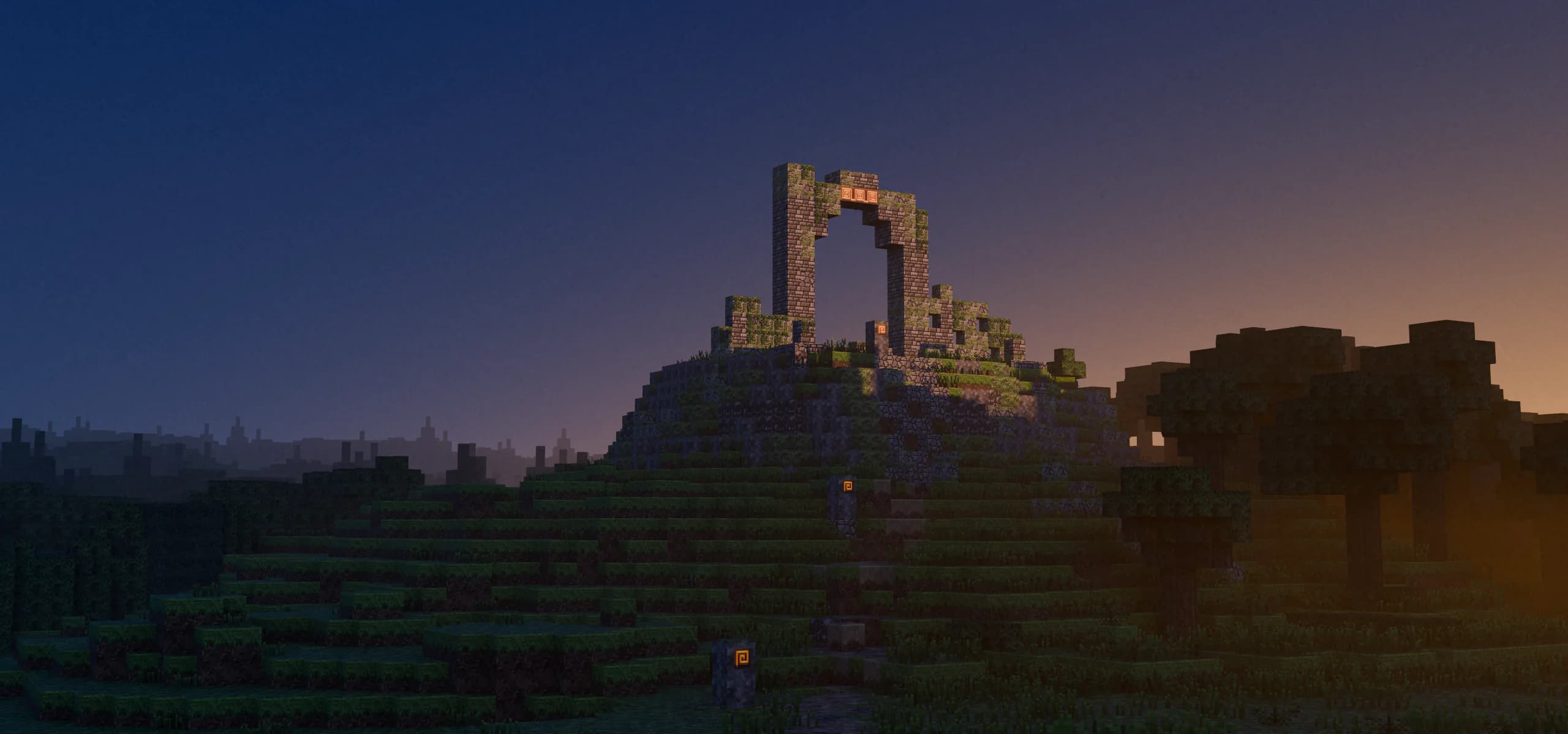 Voxel landscape at dusk: a moss-covered stone ruin on a hilltop, with a copper inscription on its arch catching the last light.